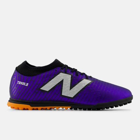 Chuteira Society New Balance Tekela Magique TF V4+ Cano Baixo Azul Marinho